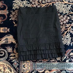 Bebe black pencil skirt with ruffles and details.